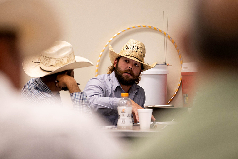 ranchers talking in a group session
